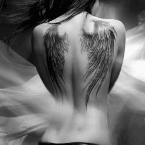 Id love a set of wings, with a lot of detail and a little splash of colour. #dreamtattoo 