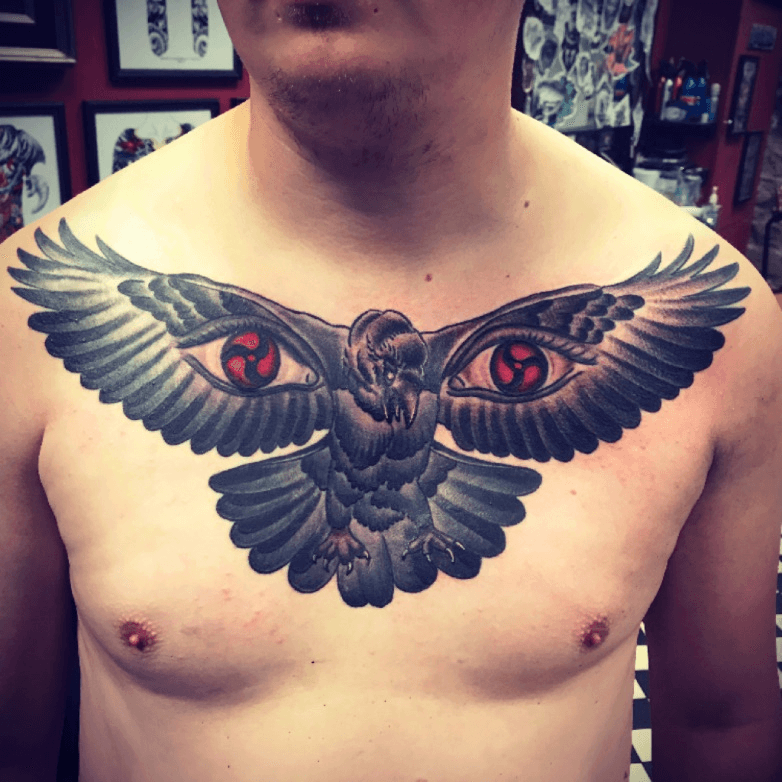 Open Wings Flying Crow Tattoo On Chest