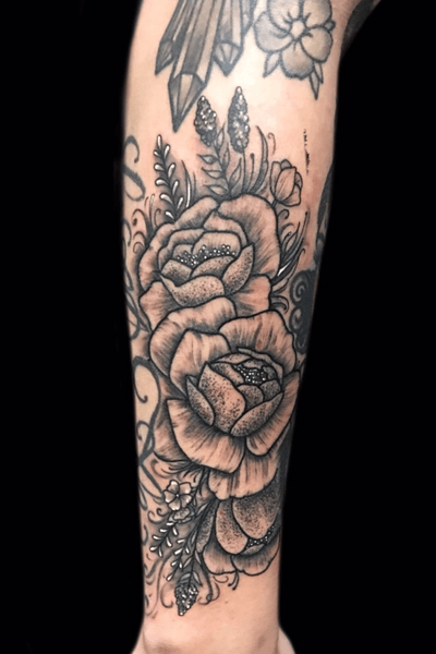 Fine line blackwork peony tattoo