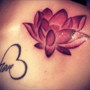 Red lotus flower and infinity love heart