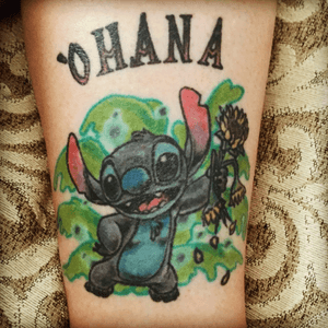 Stitch holding sunflowers for my daughter... 