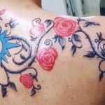 Cover up and joining of small rose on right shoulder to blue sun on back (which is now green) want this now all the way down my back #wrexhamink #princesstattooing