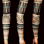 I never thought about adding color, but might have to do it. #sleeve #mandala #tribaltattoos #linework #teal 