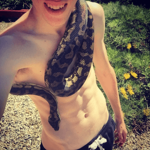 Tattoo idea?  My pet snake and myself chilling in the sun! #tattoo #snaketattoo #snake #tattooideas #petsnake #australian #dreamtattoo 