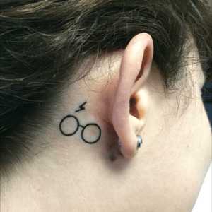 Harry Potter behind the ear tattoo. 