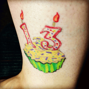 Cupcake to commemerate my graduating from culinary school with a degree in baking and pastry in 2013. Done by Conrad Williams in Lansing, Michigan #cupcake #candles #13 #thirteen #dessert #desserts 