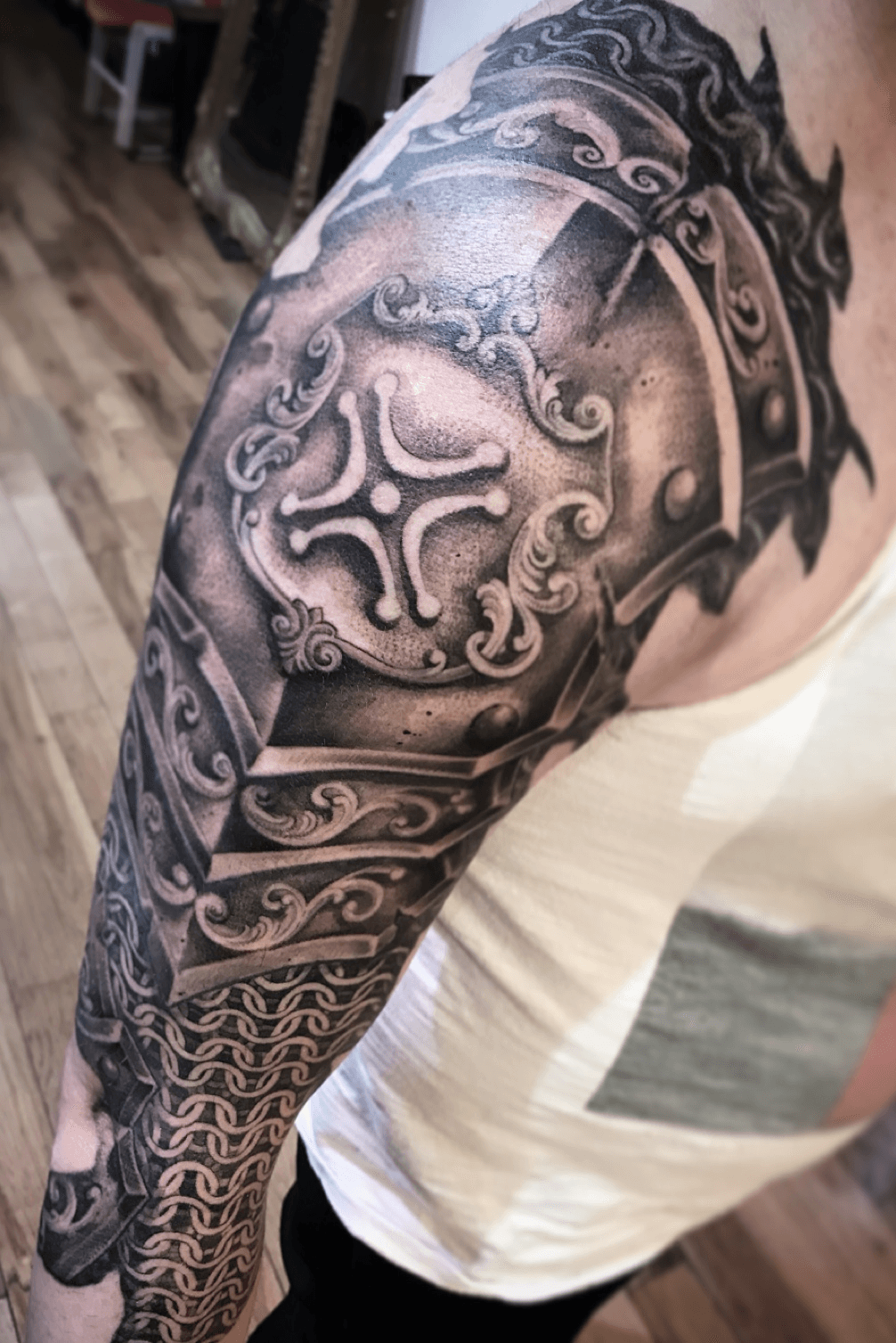 Tattoo with the image of chain mail or knight armor is very popular and  common among men Such a tattoo is masculine  VK