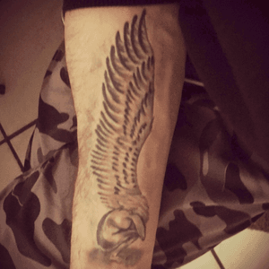 This is my 2rd tattoo. This is made by a friend of mine. This tattoo is for my father who died when I was young. This is a crying angel.