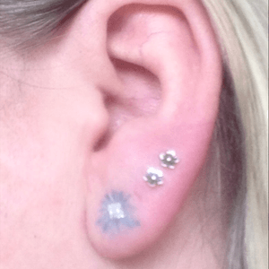 #earlobetattoo #ear #lobe #flower #cornflower in #blue - #tattoo #artist #tattoosbytuffe @tattoosbytuffe - #ear #piercings 