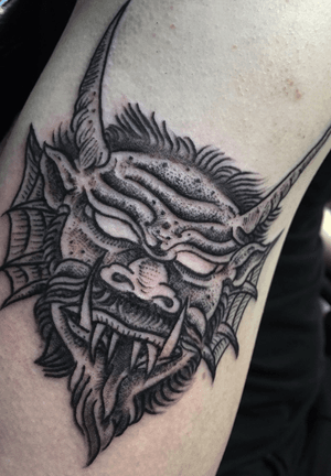 Devil face tattoo by tattoo artist WELT