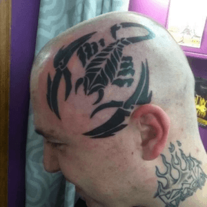 Scorpion head done in 2013 at Body Animations Tattoo Parlor(now Animations Studios)