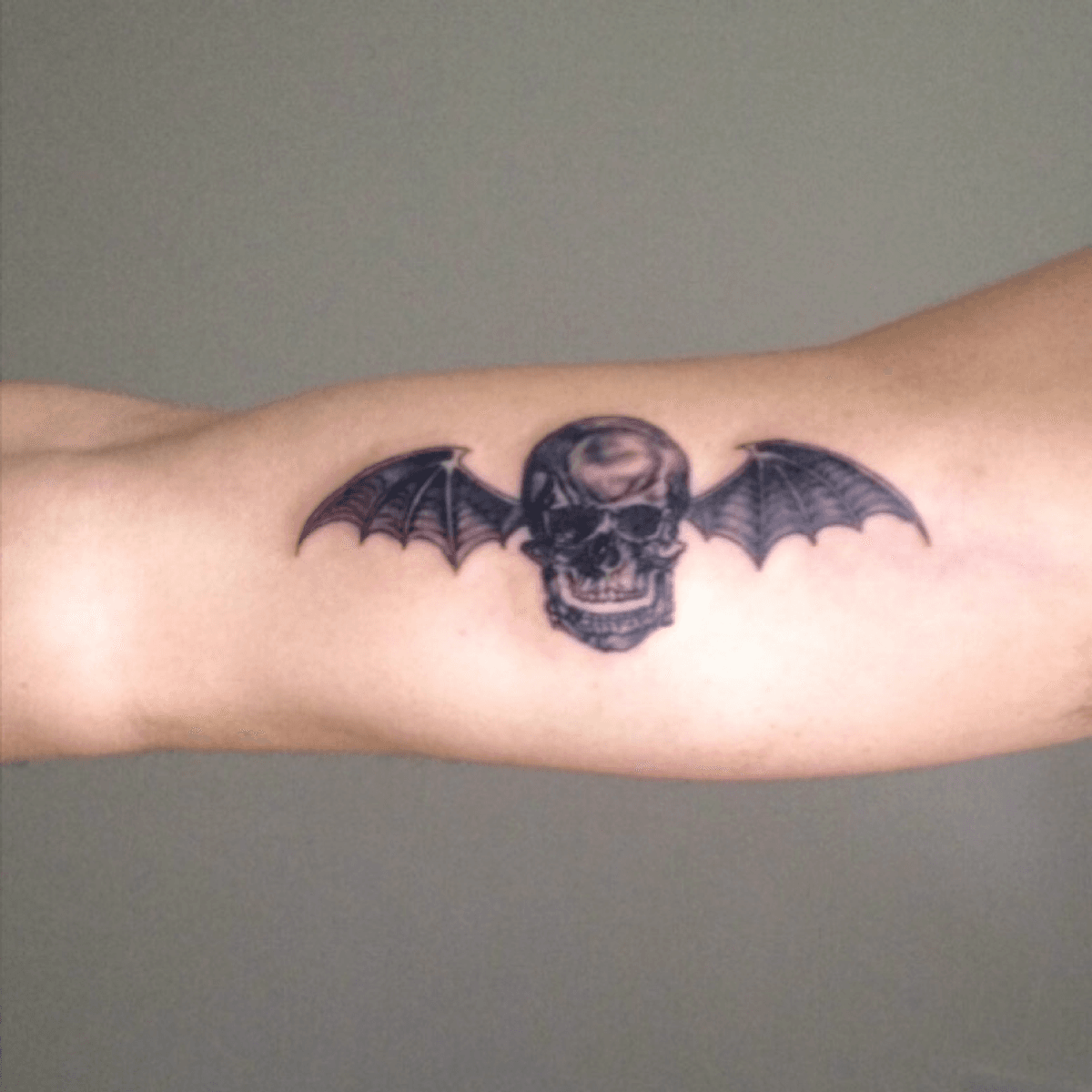 Tattoo uploaded by JackJD • Tattoo made by -Marcin Art in Farnborough.  Great artist and great tattoos! #a7x #avengedsevenfold #tattoo #bicep #cool  #notlast #metal #black #blackAndWhite #mybody #design #tattoodesign  #tattooart #arm #armtattoos #