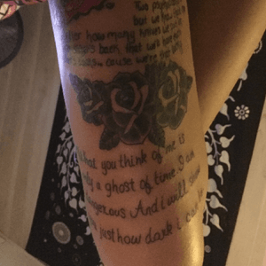 Added black roses with quote saying.. "What you think of me is only a ghost of time. I am dangerous. And I will show you just how dark I can be." #flowertattoo #quoteoftheyear #blackwork #thightattoo #loyaltytattoo 