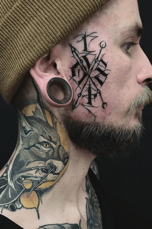 Healed neck + face tattoo lettering done by Georg Faust @ Black Oaks Tattoo