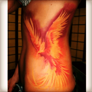 #dreamtattoo I would love something similar to this in shades of pink and purple on my upper back. Ive had some stuff go wrong in my life recently, so the phoenix rising from the fire to freedom would be perfect. A lasting reminder that we can overcome all the bad stuff or harsh times that life throws at us. 