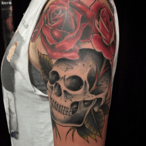 Skull and drawn on rose. Roses to left werent done by me. 