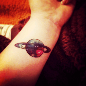 My first ever tattoo ❤️🌙✨#planet #saturn #watercolour #northernglorytattoonewcastle #northernglory #spacetattoo #space #scifi #wristtatoo #didnthurtatall 