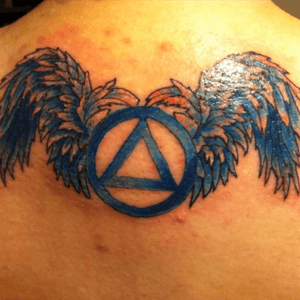 This symbol is sober without alcoholic and drug addict with humble wings. Very important to keep me staying a sober that way. Tattoo Artist Brittany Sinclair, She is deaf.... very professional tattooist. Also i am deaf too. Brittany and i can able communication very fluent American Sign Language. I'm very happy about this beautiful tattoo wing with symbol. I feel very proud of my sober for 21 years. Feel good.  #megandreamtattoo 