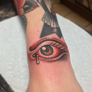 Eye filler under some awesome Wes Carter tattoos.
