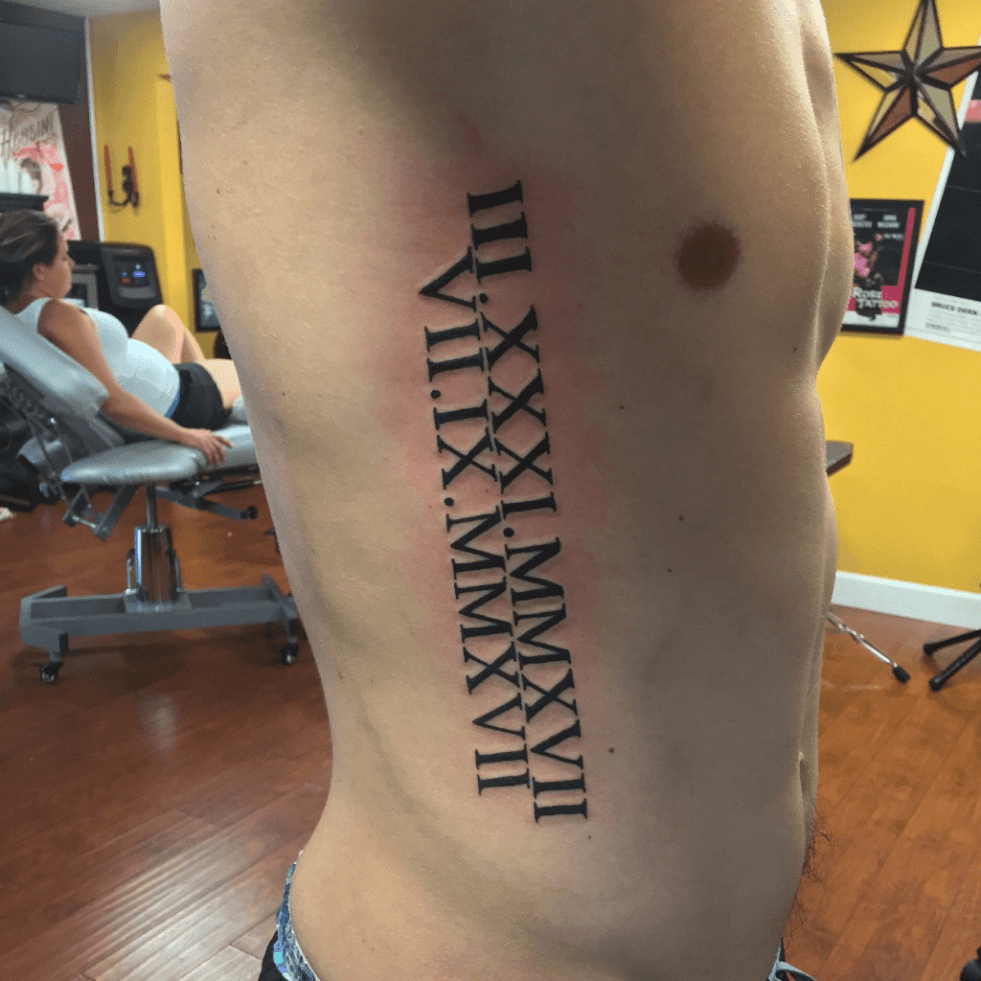 ZEN TATTOO  roman numerals ribs tattoo tattooed ink