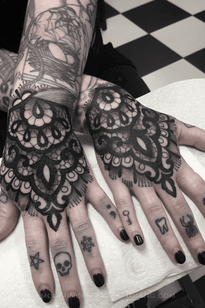 Get an intricate ornamental mandala tattoo on your hand in London. Perfect blend of artistic design and traditional motif.