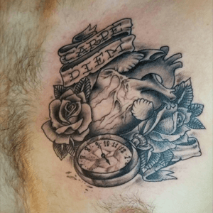 Imagery for lyrics to my favorite song "Seize the day" by avenged sevenfold. "Seize the day or die regretting the time you lost". Carpe diem is seize the day in latin. The black roses resemble death. And the shattered pocket watch is lost time. 