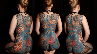 Elegant body suit showcasing a Japanese style snake and chrysanthemum design by renowned artist Stewart Robson.