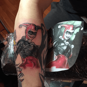 Harley Quinn tattoo on right forearm