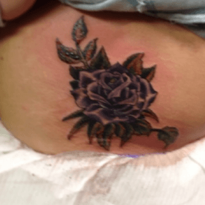 Love love love roses. my first tat lost a lot of weight since then still looks great #rose #purple 