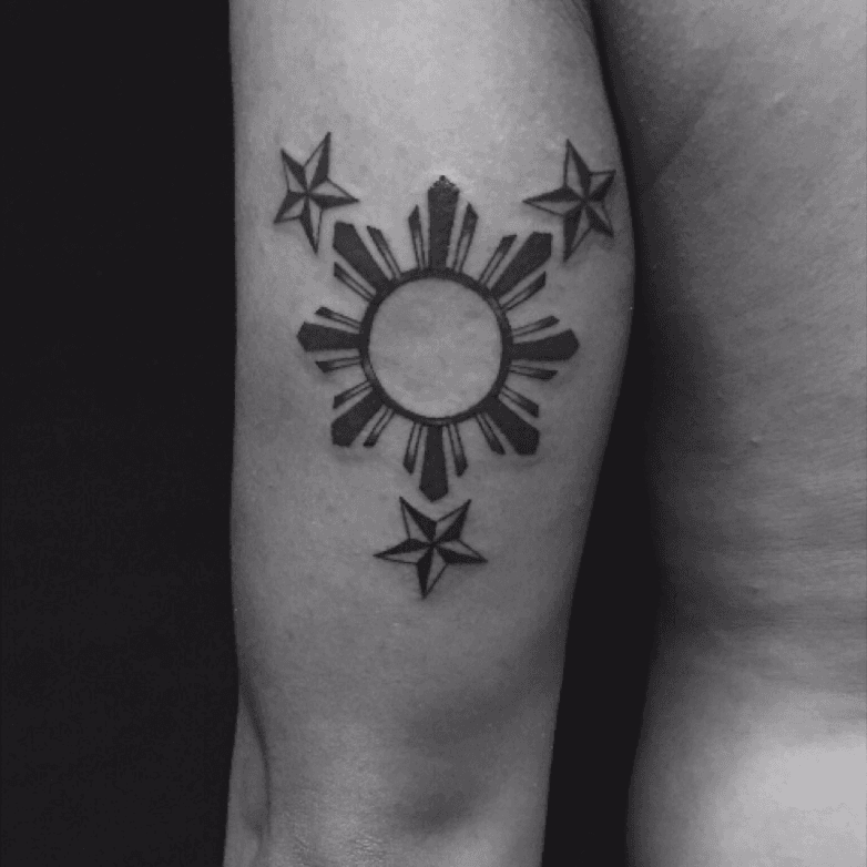 Tattoo uploaded by Mark Quinatadcan Kusano • 3 stars in a sun. Tattoo by ann savage! • Tattoodo