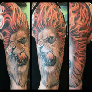 Love this lion tattoo really stands out with the flame mane