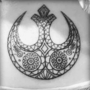 To combine my love of Disney and Star Wars I would love to get the Rebel Alliance symbol but have it filled with images that represent all the Disney Princesses. #megandreamtattoo 