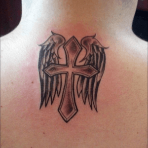 Cross with wings done in Orlando at Hart and Huntington Tattoos!