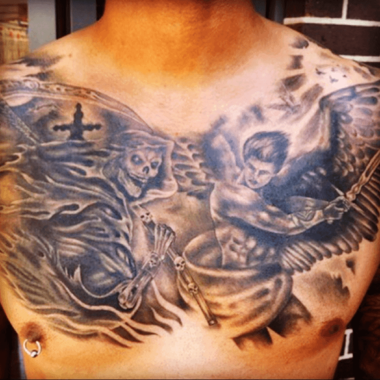 angels fighting demons back tattoos