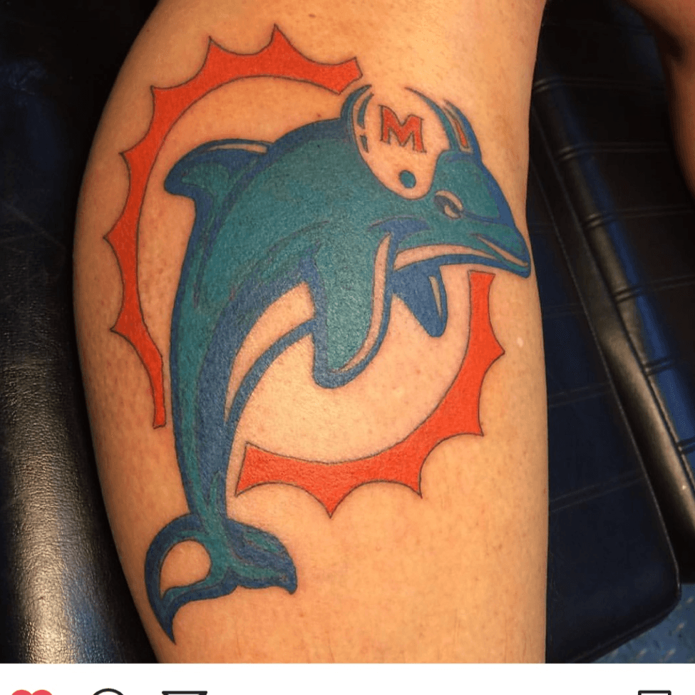 Fan gets tattoo of new Dolphins logo hopes owner pays for it   CBSSportscom