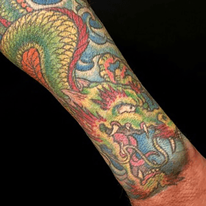 Tattoo by Lark Tattoo artist/owner Bruce Kaplan. See more of Bruce's work here: http://www.larktattoo.com/long-island-team-homepage/bruce/.. . . .#colortattoo #colorbomb #colorbombtattoo #Japanese #Japanesetattoo #dragon #dragontattoo #Japanesedragontattoo #tattoo #tattoos #tat #tats #tatts #tatted #tattedup #tattoist #tattooed #inked #inkedup #ink #tattoooftheday #amazingink #bodyart #tattooig #tattoosofinstagram #instatats  #larktattoo #larktattoos #larktattoowestbury #westbury #longisland #NY #NewYork #usa #art
