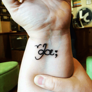 This tattoo has 5 elements. 1) is the bird because i am seeking my freedom 2) "Le" is Swedish for smile and its in remembrance of my grandfather who was 1/2 Swedish 3) the infinity made up in the L is so that I will remember him always 4) a heart to always love myself 5) the semicolon because my story isnt over yet. #swedishsmile #livingcanvas #semicolontattoo #infinity #freedom #loveyourself 