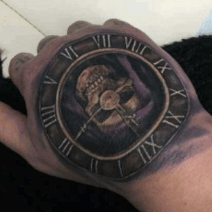 Clock hand tattoo by Steve Morris. #clock #skull #handtattoo #reaper #stevemorris #freshink 