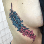 Colorful feather #color #ribtattoo #sidetattoo #colortattoo #tattoo #tattoos #tattooart #tattooartist #tattooshop #feathertattoo #feather #neworleans 