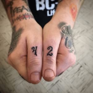 42 on thumbs. Hitchhikers Guide to the Galaxy. Done by Terry Daniels of Survivor Ink in Hamburg, IA #survivorink #Hitchhikersguidetothegalaxy #42 #thumbtattoo 