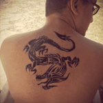 Trying something new with a dragon #beachtattoo #dragon 