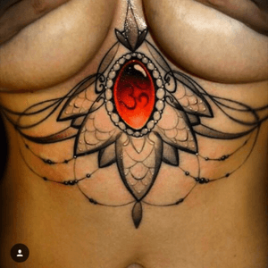 underboob tattoo by otte timar from hungary❤️ #underboob #om #stone #sternum #dreamtattoo 