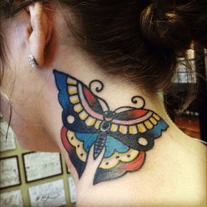 Traditional butterfly by Joel Janiszyn at Black Anvil Tattoo in Fort Wayne Indiana #traditional #necktattoo #butterflytattoo 