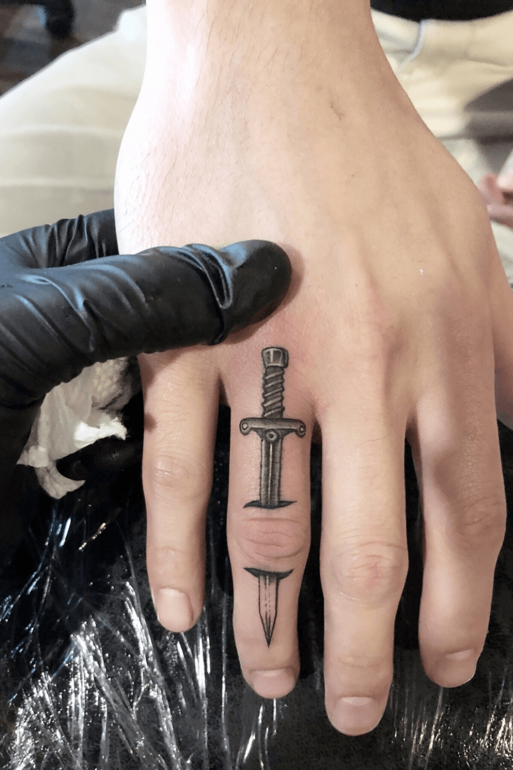 Tattoo uploaded by JoJo  finger tattoo sword fingertattoo smalltattoo  sword  Tattoodo