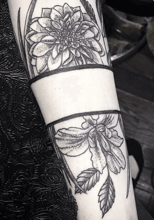 Custom floral arm band by Brigid Burke #customtattoo #Custom #flowertattoo #floral #flower #flowers #dotwork #blackwork #iris #dalilah #forearm #forearmtattoo 