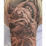 My #dreamtatto made by Ami James would be a black&gray dragon like this. 