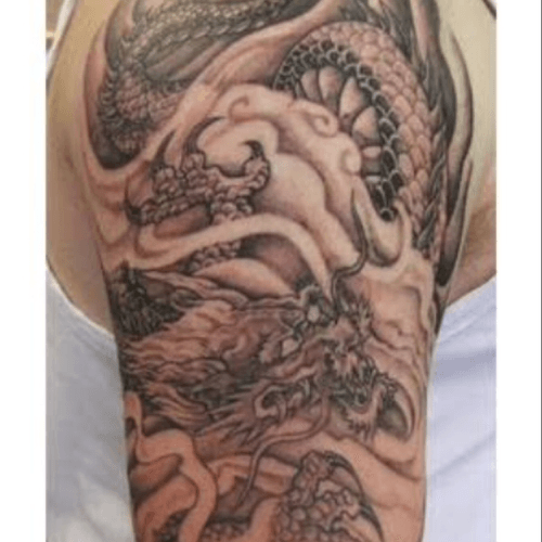 My  #dreamtatto made by Ami James would be a black&gray dragon like this. 
