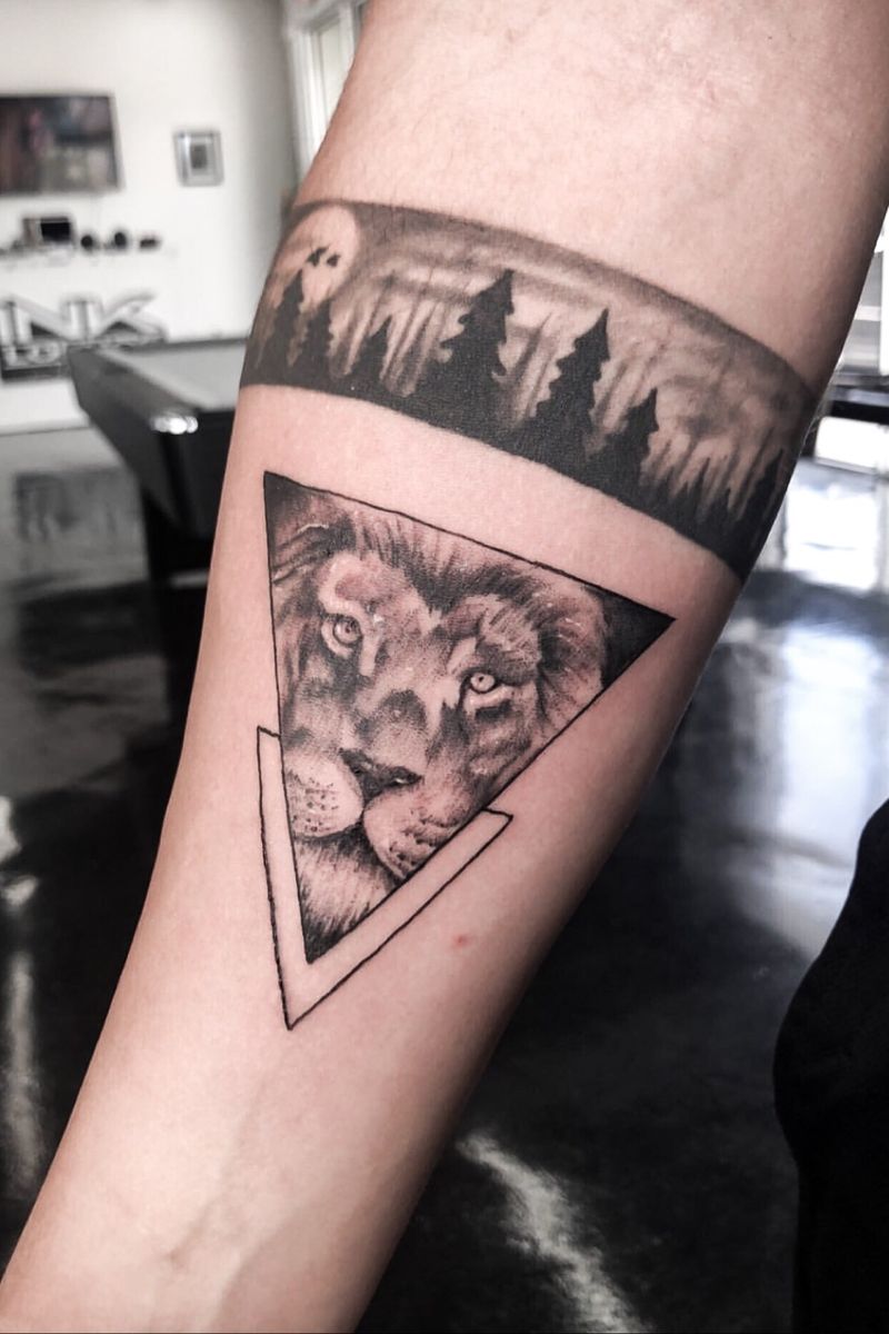 Tattoo uploaded by Alex ''Pain'' Laporte • Triangle Lion Tattoo • Tattoodo