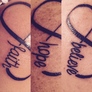 Myself and 2 daughters went together and had these tattoos done. They are infinity with each of our keywords. Mine is believe. We also are adding one symbol from each of us to the tattoo. We have added ladybugs from my younger daughter, it is her totem. I am adding a fairy. My oldest daughter hasnt decided yet. I need to add pic of tatto with updated ladybugs. My first tatto at 60yrs old!