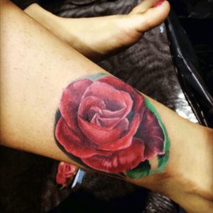 Rose ankle tattoo done by bj inks from las vegas at the SD tattoo conventikn